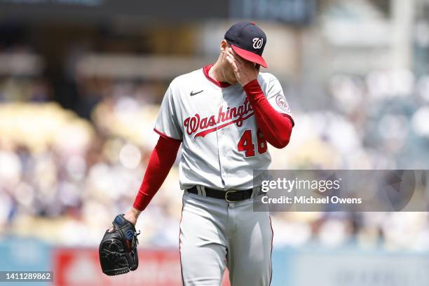 Patrick Corbin of the Washington Nationals reacts after giving up six runs against the Los Angeles Dodgers during the first inning at Dodger Stadium...