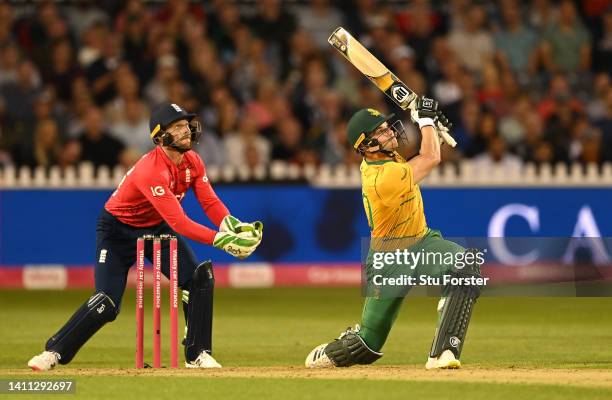 South Africa batsman Tristan Stubbs hits a six watched by Jos Buttler during the 1st Vitality IT20 match between England and South Africa at Seat...