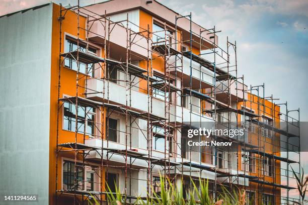 renovation of a new building - exterior home insulation stock pictures, royalty-free photos & images