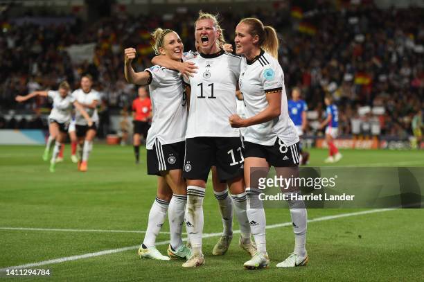 Alexandra Popp of Germany celebrates scoring their side's second goal with teammates during the UEFA Women's Euro 2022 Semi Final match between...