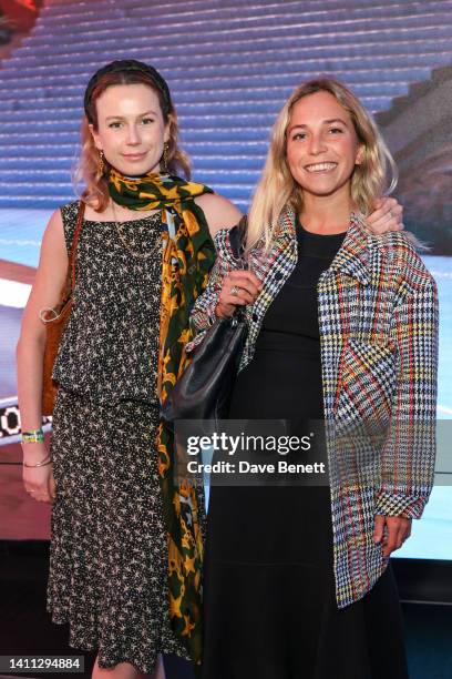 Francesca Durnford and Ayesha Shand attend the launch of Cult & Rain's Cultr World with Outernet London at Outernet on July 27, 2022 in London,...