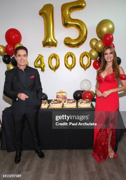 Personalities Jorge Antolin and Lianna Grethel attend the celebration for "Alarma TV's" 4,000th episode at Estrella TV Studios on July 27, 2022 in...