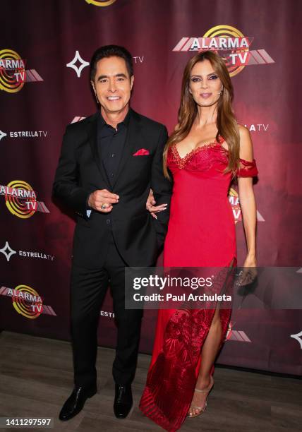Personalities Jorge Antolin and Lianna Grethel attend the celebration for "Alarma TV's" 4,000th episode at Estrella TV Studios on July 27, 2022 in...