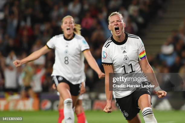 Alexandra Popp of Germany celebrates scoring their side's second goal during the UEFA Women's Euro 2022 Semi Final match between Germany and France...