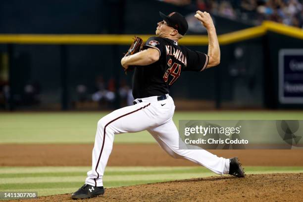 Mark Melancon of the Arizona Diamondbacks throws a pitch during the ninth inning against the San Francisco Giants at Chase Field on July 27, 2022 in...