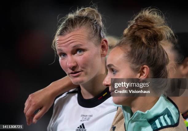 Alexandra Popp and Lina Magull of Germany celebrate after the UEFA Women's Euro 2022 Semi Final match between Germany and France at Stadium mk on...