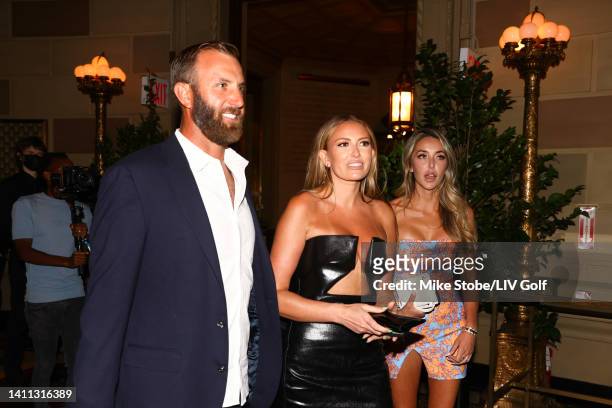 Team Captain Dustin Johnson of 4 Aces GC and wife Paulina Gretzky arrive to the welcome party for the LIV Golf Invitational - Bedminster at Gotham...