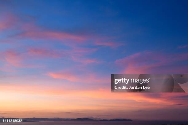 dramatic cloudscape in the morning - purple sky fotografías e imágenes de stock