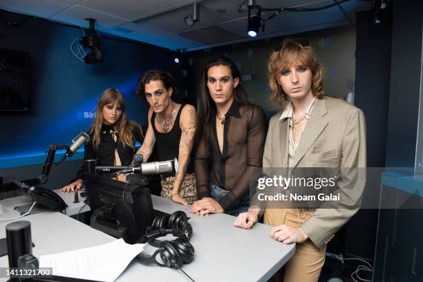 Victoria De Angelis, Damiano David, Ethan Torchio and Thomas Raggi of Maneskin visit the SiriusXM Studios on July 27, 2022 in New York City.