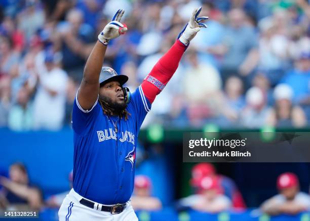 Vladimir Guerrero Jr. #27 of the Toronto Blue Jays celebrates his home run against the St. Louis Cardinals in the first inning during their MLB game...