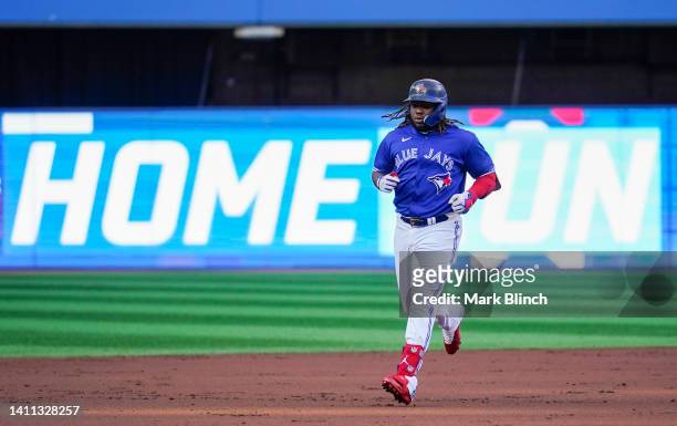 Vladimir Guerrero Jr. #27 of the Toronto Blue Jays rounds the bases on his home run against the St. Louis Cardinals in the first inning during their...
