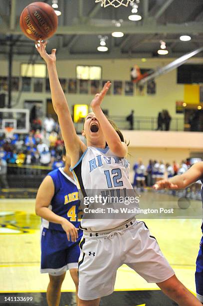 River Hill's Jordan Masker drives to the basket late in the game with Aberdeen in the Maryland 3A championship game at UMBC on March10, 2012 in...