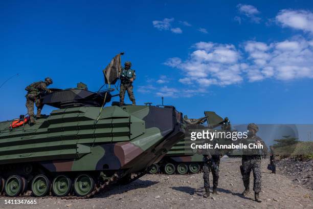 Soldiers prepare AAV7 amphibious assault vehicles after an amphibious landing drill during the Han Kuang military exercise, which simulates China's...