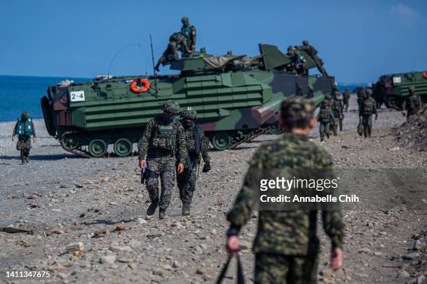 Soldiers prepare AAV7 amphibious assault vehicles after an amphibious landing drill during the Han Kuang military exercise, which simulates China's...
