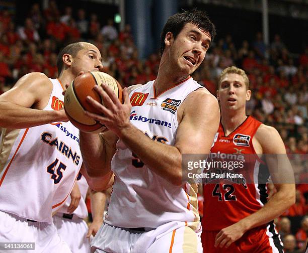 Brad Hill of the Taipans pulls in a rebound during the round 23 NBL match between the Perth Wildcats and the Cairns Taipans at Challenge Stadium on...