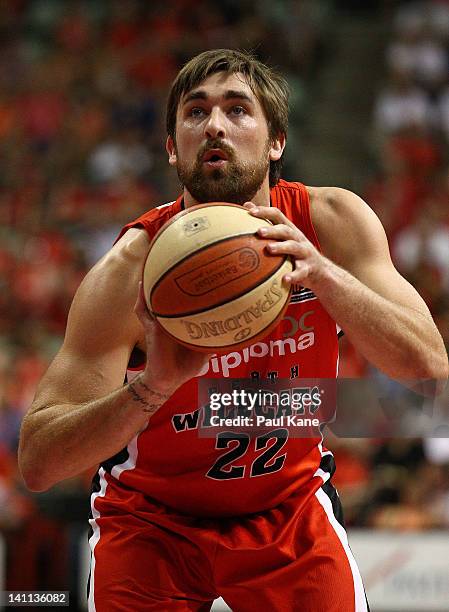 Brad Robbins of the Wildcats prepares to shoot a free throw during the round 23 NBL match between the Perth Wildcats and the Cairns Taipans at...