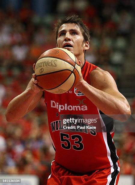Damian Martin of the Wildcats prepares to shoot a free throw during the round 23 NBL match between the Perth Wildcats and the Cairns Taipans at...