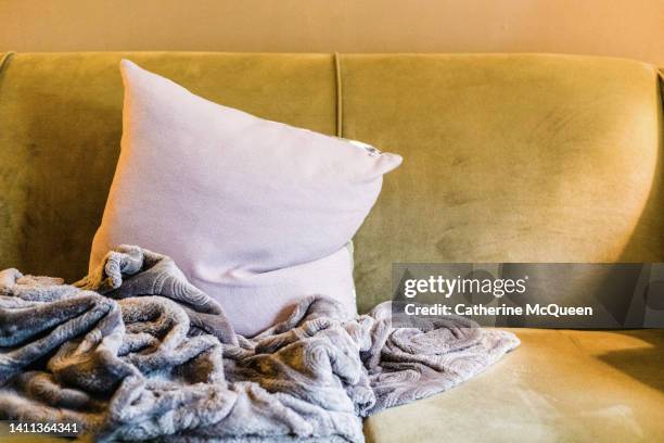 sofa, throw pillow & chenille throw blanket - upholstered chair stock-fotos und bilder