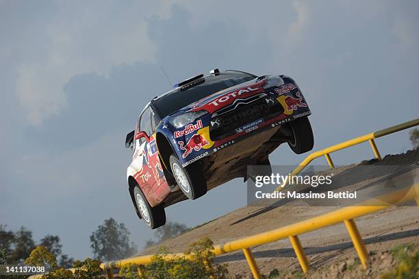 Sebastien Loeb of France and Daniel Elena of Monaco compete in their Citroen Total WRT Citroen DS3 WRC during Day Two of the WRC Rally Mexico on...