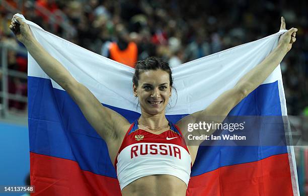 Elena Isinbaeva of Russia celebrates as she wins gold in the Women’s Pole Vault Final during day three of the 14th IAAF World Indoor Championships at...