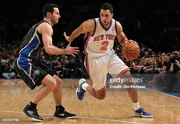 Landry Fields of the New York Knicks in action against J.J. Redick of the Orlando Magic on January 16, 2012 at Madison Square Garden in New York...