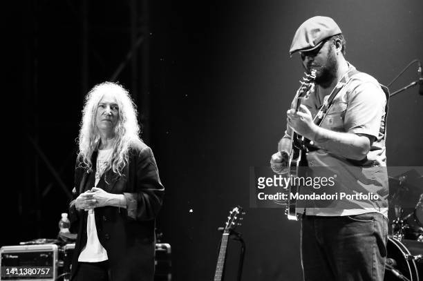 Image has been converted to black and white) Patti Smith Quartet. American singer-songwriter and poet Patti Smith in concert at the Auditorium Parco...