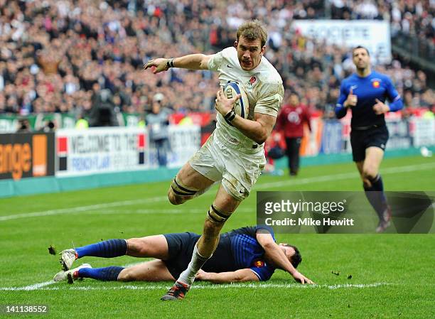 Tom Croft of England goes over to score his try during the RBS 6 Nations match between France and England at Stade de France on March 11, 2012 in...