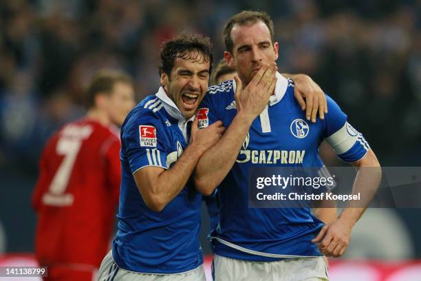 Christoph Metzelder of Schalke celebrates the second goal with Raul Gonzalez during the Bundesliga match between FC Schalke 04 and Hamburger SV at...