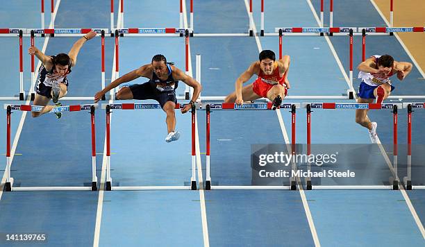 Aries Merritt of the United States competes with Lui Xiang of China , Andrew Pozzi of Great Britain and Konstantin Shabanov of Russia in the Men’s 60...