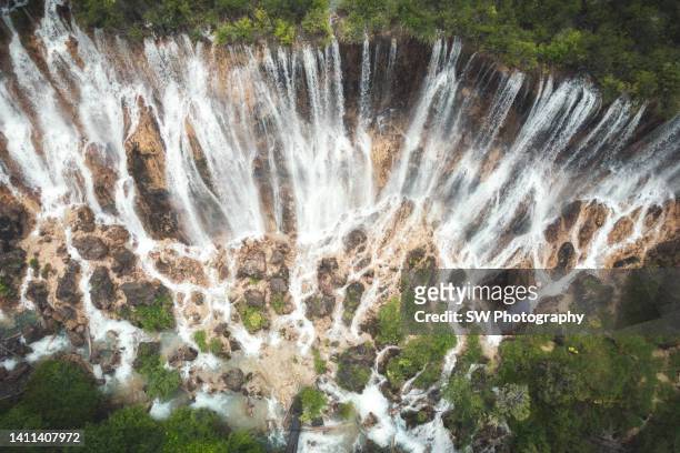 beautiful waterfall from the mountain at jiuzhaigou national park - jiuzhaigou imagens e fotografias de stock