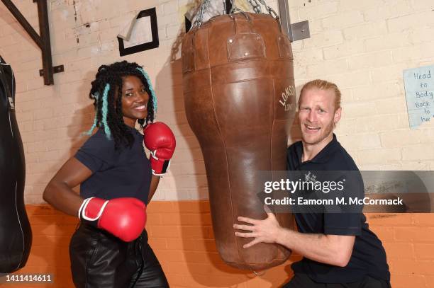 Ama Agabeze and Jonnie Peacock pose as The National Lottery celebrates the start of the Birmingham 2022 Commonwealth Games at Birmingham youth sports...