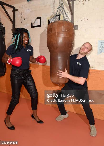 Ama Agabeze and Jonnie Peacock pose as The National Lottery celebrates the start of the Birmingham 2022 Commonwealth Games at Birmingham youth sports...