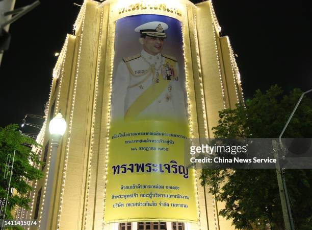 Portrait of Thailand's King Maha Vajiralongkorn is seen on the facade of a building during celebrations for the 70th birthday of the King on July 27,...
