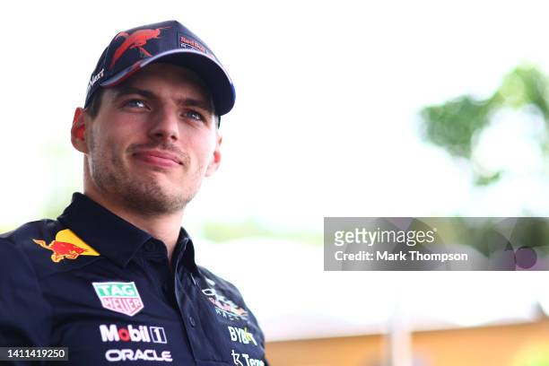 Max Verstappen of the Netherlands and Oracle Red Bull Racing looks on in the Paddock during previews ahead of the F1 Grand Prix of Hungary at...
