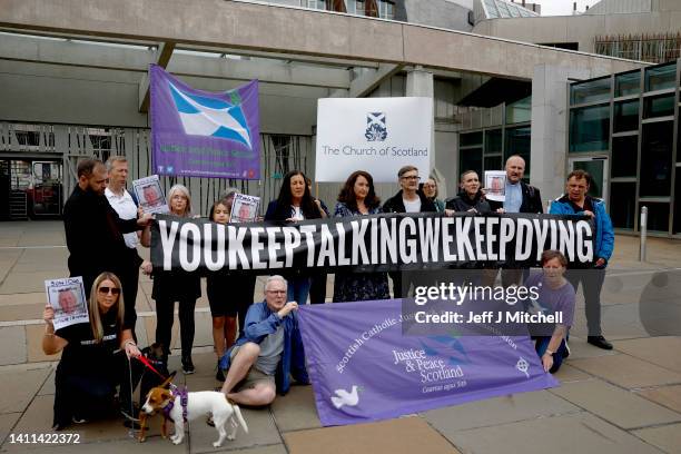The group Faces And Voices of Recovery hold a protest outside the Scottish Parliament as Scotland’s drugs death figures are published on July 28,...