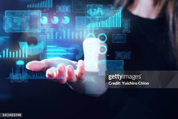 woman showing data - digital composite image stock pictures, royalty-free photos & images