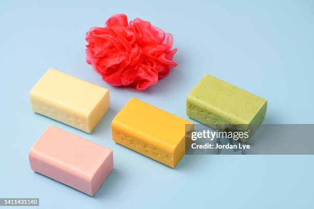 colorful handmade soap bars on color background - homemade soap stock pictures, royalty-free photos & images