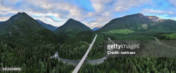 highway crossing a large river - canada forest stock pictures, royalty-free photos & images