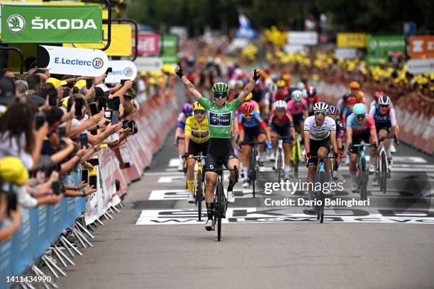 Lorena Wiebes of Netherlands and Team DSM Women - Green Points Jersey celebrates at finish line as stage winner ahead of Elisa Balsamo of Italy and...