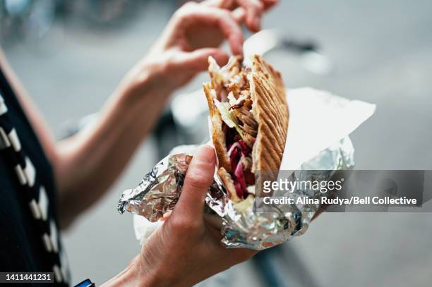 close-up of a doner kebab - street food stock pictures, royalty-free photos & images