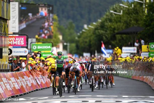 Lorena Wiebes of Netherlands and Team DSM Women - Green Points Jersey celebrates at finish line as stage winner ahead of Elisa Balsamo of Italy and...