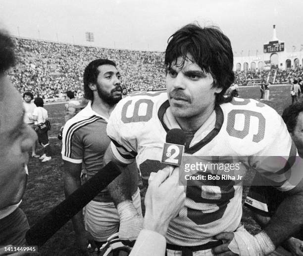 New York Jets Mark Gastineau speaks with reporters after Jets won AFC Playoff game, January 15, 1983 in Los Angeles, California.