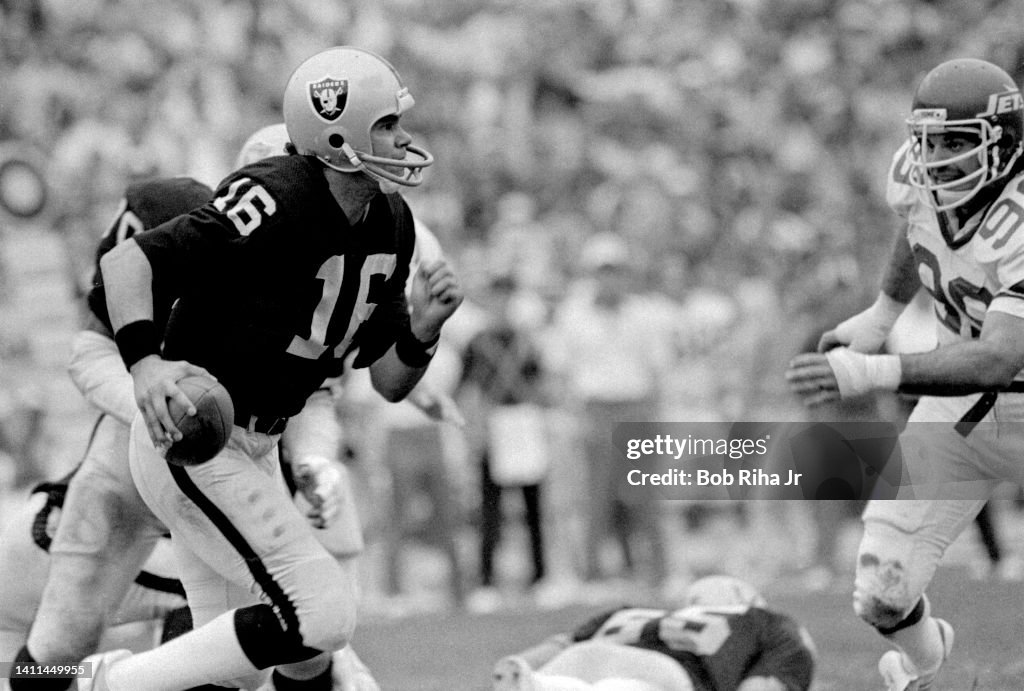 Jim Plunkett chased by Mark Gastineau during AFC Playoffs - Raiders v. Jets