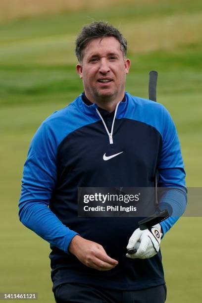 Former footballer Robbie Fowler in action during the celebrity ProAm prior to The JCB Championship at JCB Golf & Country Club on July 28, 2022 in...