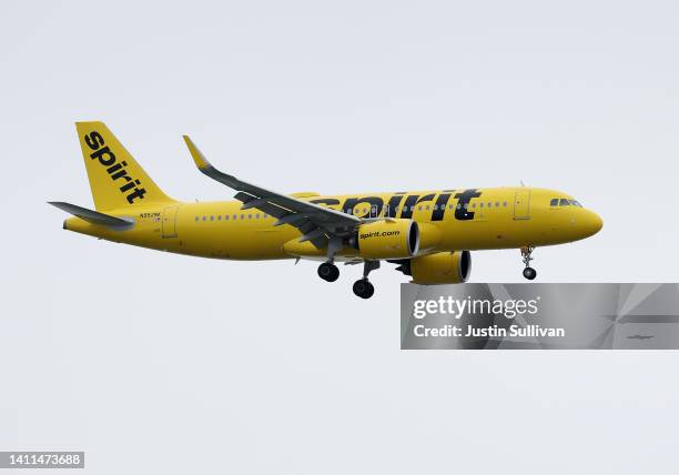 Spirit Airlines plane lands at Oakland International Airport on July 28, 2022 in Oakland, California. JetBlue Airways announced plans to purchase...