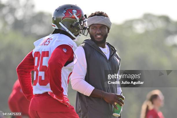 Chris Godwin talks with Julio Jones of the Tampa Bay Buccaneers during the 2022 Buccaneers Training Camp at the AdventHealth Training Center on July...