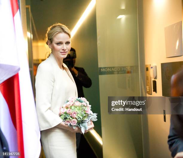 In this handout image provided by Fondation Princesse Charlene, HSH Princess Charlene of Monaco visits Monaco House on March 9, 2012 in Melbourne...