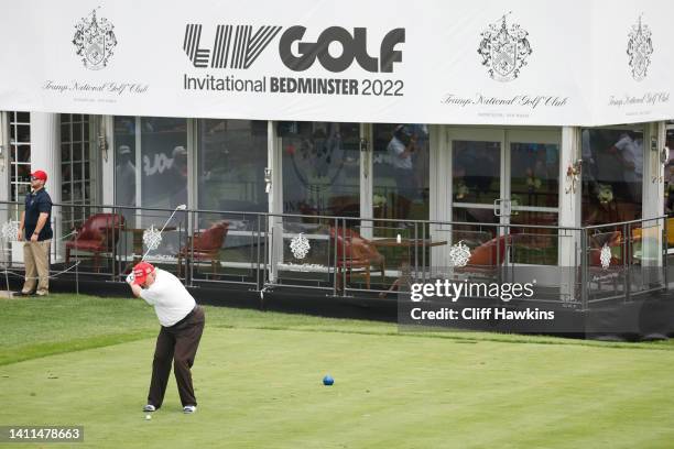 Former U.S. President Donald Trump plays his shot from the 16th tee during the pro-am prior to the LIV Golf Invitational - Bedminster at Trump...