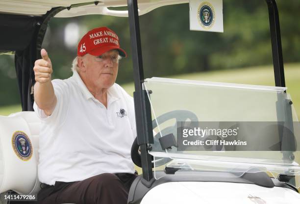 Former U.S. President Donald Trump gives a thumbs up during the pro-am prior to the LIV Golf Invitational - Bedminster at Trump National Golf Club...