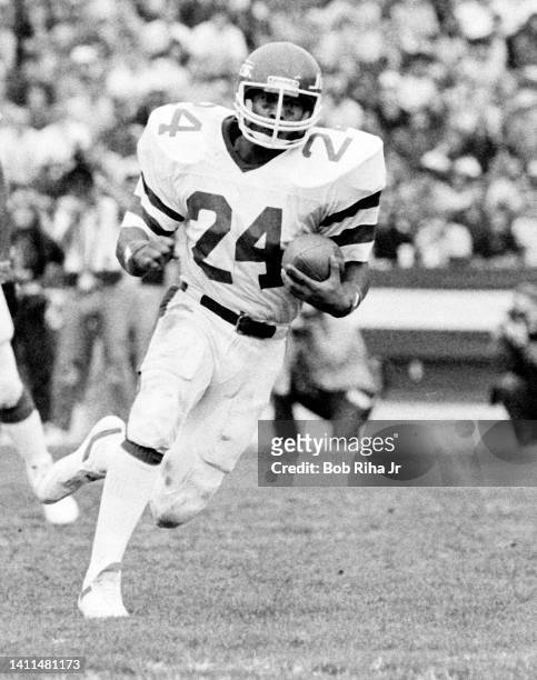 Jets RB Freeman McNeil runs and is tackled by Raiders Howie Long during AFC Playoff game, January 15, 1983 in Los Angeles, California.
